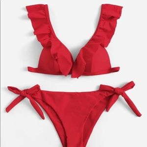 Ruffle plunging top with tie side bikini set